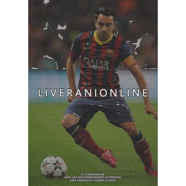 XAVI BARCELONA FC MANCHESTER CITY V BARCELONA FC, CHAMPIONS LEAGUE ETIHAD STADIUM, MANCHESTER, ENGLAND 18 February 2014 GAT78713 MANCHESTER CITY V BARCELONA FC CHAMPIONS LEAGUE 1ST LEG 18/02/14 WARNING! This Photograph May Only Be Used For Newspaper And/Or Magazine Editorial Purposes. May Not Be Used For Publications Involving 1 player, 1 Club Or 1 Competition Without Written Authorisation From Football DataCo Ltd. For Any Queries, Please Contact Football DataCo Ltd on +44 (0) 207 864 9121 AG ALDO LIVERANI SAS ONLY ITALY