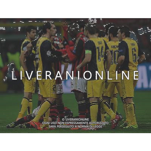 UEFA Champions League 2013/2014 Ottavi di Finale Andata Milano - 19.02.2014 Milan-Atletico Madrid Nella Foto:scontro balotelli godin dopo il duro fallo su de sciglio /Ph.Vitez-Ag. Aldo Liverani