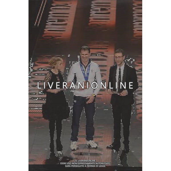 Seconda Serata 64mo Festival della Canzone Italiana di Sanremo 19 febbraio 2014 Nella foto: Armin Zoeggeler con luciana littizzetto e fabio fazio ©gazzaniga/AGENZIA ALDO LIVERANI SAS