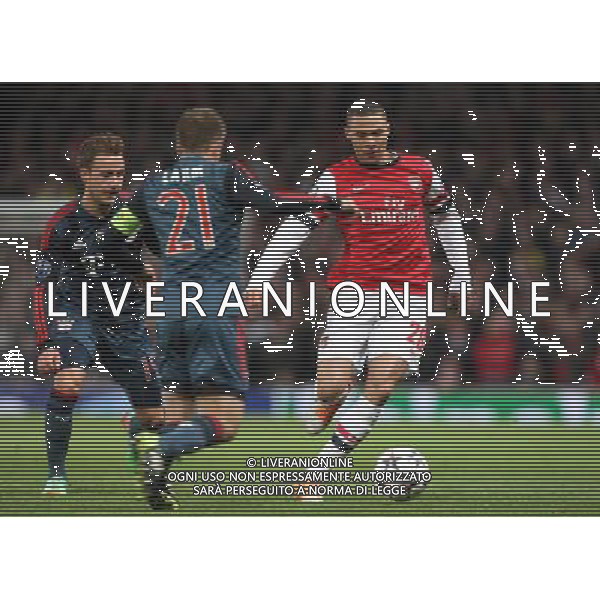 Arsenal\'s Kieran Gibbs Photo by Kieran Galvin/CameraSport Football - UEFA Champions League First Knockout Round - Arsenal v Bayern Munich - Wednesday 19th February 2014 - Emirates Stadium - London © CameraSport - 43 Linden Ave. Countesthorpe. Leicester. England. LE8 5PG - Tel: +44 (0) 116 277 4147 - admin@camerasport.com - www.camerasport.com AG ALDO LIVERANI SAS ONLY ITALY