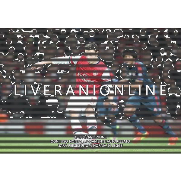 Arsenal\'s Mesut Ozil miss the penalty Photo by Kieran Galvin/CameraSport Football - UEFA Champions League First Knockout Round - Arsenal v Bayern Munich - Wednesday 19th February 2014 - Emirates Stadium - London © CameraSport - 43 Linden Ave. Countesthorpe. Leicester. England. LE8 5PG - Tel: +44 (0) 116 277 4147 - admin@camerasport.com - www.camerasport.com AG ALDO LIVERANI SAS ONLY ITALY