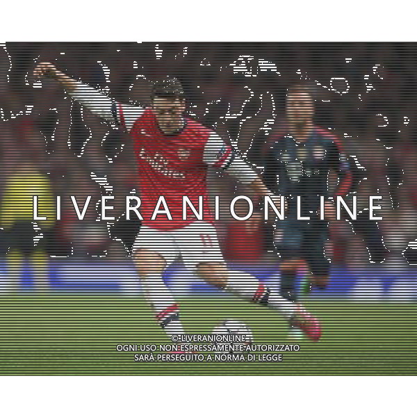 Arsenal\'s Mesut Ozil Photo by Kieran Galvin/CameraSport Football - UEFA Champions League First Knockout Round - Arsenal v Bayern Munich - Wednesday 19th February 2014 - Emirates Stadium - London © CameraSport - 43 Linden Ave. Countesthorpe. Leicester. England. LE8 5PG - Tel: +44 (0) 116 277 4147 - admin@camerasport.com - www.camerasport.com AG ALDO LIVERANI SAS ONLY ITALY