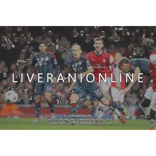 Bayern Munich\'s Thomas Mullerscores 2nd goal Photo by Kieran Galvin/CameraSport Football - UEFA Champions League First Knockout Round - Arsenal v Bayern Munich - Wednesday 19th February 2014 - Emirates Stadium - London © CameraSport - 43 Linden Ave. Countesthorpe. Leicester. England. LE8 5PG - Tel: +44 (0) 116 277 4147 - admin@camerasport.com - www.camerasport.com AG ALDO LIVERANI SAS ONLY ITALY