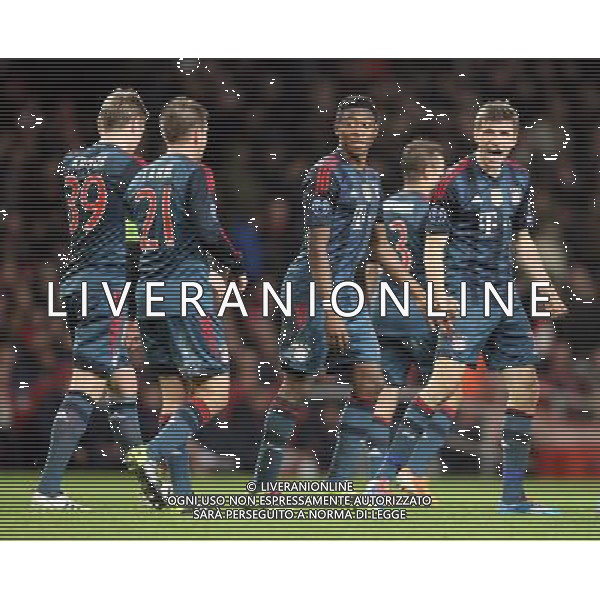 Bayern Munich\'s Thomas Muller celebrates scoring his sides second goal Photo by Kieran Galvin/CameraSport Football - UEFA Champions League First Knockout Round - Arsenal v Bayern Munich - Wednesday 19th February 2014 - Emirates Stadium - London © CameraSport - 43 Linden Ave. Countesthorpe. Leicester. England. LE8 5PG - Tel: +44 (0) 116 277 4147 - admin@camerasport.com - www.camerasport.com AG ALDO LIVERANI SAS ONLY ITALY