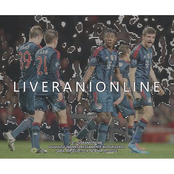 Bayern Munich\'s Thomas Muller celebrates scoring his sides second goal Photo by Kieran Galvin/CameraSport Football - UEFA Champions League First Knockout Round - Arsenal v Bayern Munich - Wednesday 19th February 2014 - Emirates Stadium - London © CameraSport - 43 Linden Ave. Countesthorpe. Leicester. England. LE8 5PG - Tel: +44 (0) 116 277 4147 - admin@camerasport.com - www.camerasport.com AG ALDO LIVERANI SAS ONLY ITALY