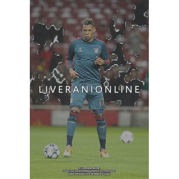 19.02.2014, Emirates Stadion, London, ESP, UEFA CL, FC Arsenal vs FC Bayern Muenchen, Achtelfinale, im Bild Jerome BOATENG #17 (FC Bayern Muenchen) beim warm up // during the UEFA Champions League Round of 16 match between FC Arsenal and FC Bayern Munich at the Emirates Stadion in London, Great Britain on 2014/02/19. EXPA Pictures © 2014, PhotoCredit: EXPA/ Eibner-Pressefoto/ Kolbert *****ATTENTION - OUT of GER***** ©PHOTOSHOT/AGENZIA ALDO LIVERANI SAS - ITALY ONLY - ARSENAL - BAYERN MONACO CHAMPIONS LEAGUE