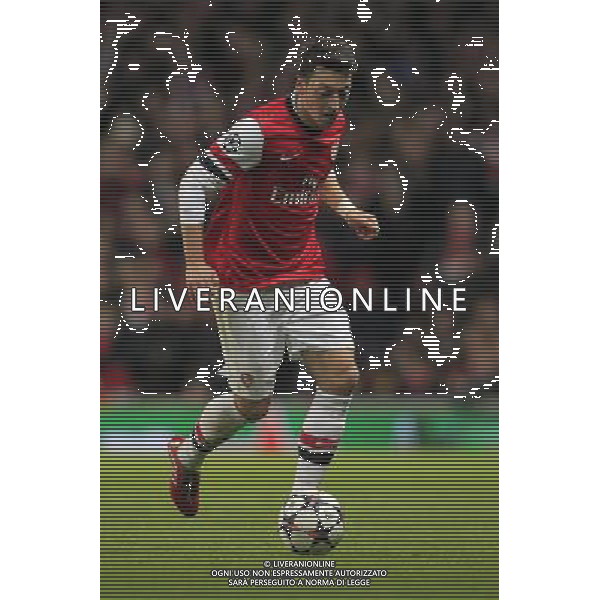 19.02.2014, Emirates Stadion, London, ENG, UEFA CL, FC Arsenal vs FC Bayern Muenchen, Achtelfinale, im Bild Mesut Oezil (Arsenal FC #11), Aktion, Action // during the UEFA Champions League Round of 16 match between FC Arsenal and FC Bayern Munich at the Emirates Stadion in London, Great Britain on 2014/02/19. EXPA Pictures © 2014, PhotoCredit: EXPA/ Eibner-Pressefoto/ Schueler *****ATTENTION - OUT of GER***** ©PHOTOSHOT/AGENZIA ALDO LIVERANI SAS - ITALY ONLY - ARSENAL - BAYERN MONACO CHAMPIONS LEAGUE