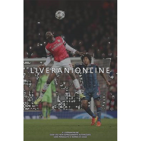 19.02.2014, Emirates Stadion, London, ENG, UEFA CL, FC Arsenal vs FC Bayern Muenchen, Achtelfinale, im Bild Yaya Sanogo (Arsenal FC #22) bei einem Kopfball, Aktion, Action // during the UEFA Champions League Round of 16 match between FC Arsenal and FC Bayern Munich at the Emirates Stadion in London, Great Britain on 2014/02/19. EXPA Pictures © 2014, PhotoCredit: EXPA/ Eibner-Pressefoto/ Schueler *****ATTENTION - OUT of GER***** AG ALDO LIVERANI SAS ONLY ITALY