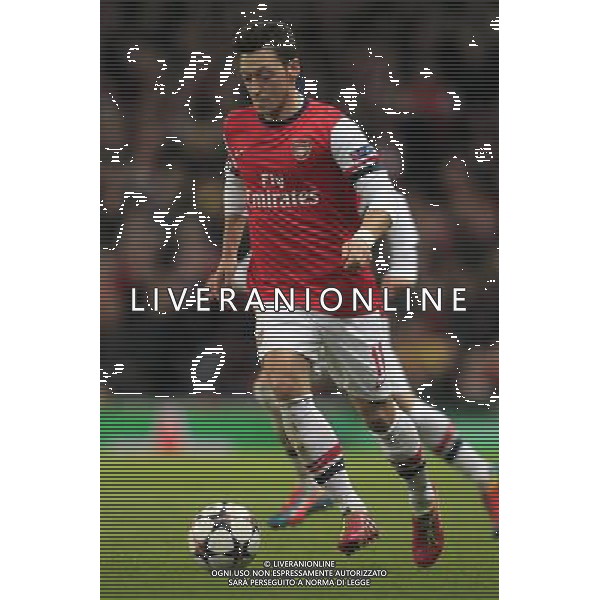 19.02.2014, Emirates Stadion, London, ENG, UEFA CL, FC Arsenal vs FC Bayern Muenchen, Achtelfinale, im Bild Mesut Oezil (Arsenal FC #11), Aktion, Action // during the UEFA Champions League Round of 16 match between FC Arsenal and FC Bayern Munich at the Emirates Stadion in London, Great Britain on 2014/02/19. EXPA Pictures © 2014, PhotoCredit: EXPA/ Eibner-Pressefoto/ Schueler *****ATTENTION - OUT of GER***** AG ALDO LIVERANI SAS ONLY ITALY