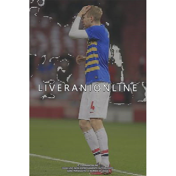 19.02.2014, Emirates Stadion, London, ENG, UEFA CL, FC Arsenal vs FC Bayern Muenchen, Achtelfinale, im Bild Per Mertesacker (Arsenal FC #4) packt sich an den Kopf // during the UEFA Champions League Round of 16 match between FC Arsenal and FC Bayern Munich at the Emirates Stadion in London, Great Britain on 2014/02/19. EXPA Pictures © 2014, PhotoCredit: EXPA/ Eibner-Pressefoto/ Schueler *****ATTENTION - OUT of GER***** AG ALDO LIVERANI SAS ONLY ITALY