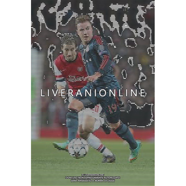19.02.2014, Emirates Stadion, London, ENG, UEFA CL, FC Arsenal vs FC Bayern Muenchen, Achtelfinale, im Bild l-r: Mathieu Flamini #20 (FC Arsenal London), Mario GOETZE #19 (FC Bayern Muenchen) // during the UEFA Champions League Round of 16 match between FC Arsenal and FC Bayern Munich at the Emirates Stadion in London, Great Britain on 2014/02/19. EXPA Pictures © 2014, PhotoCredit: EXPA/ Eibner-Pressefoto/ Kolbert *****ATTENTION - OUT of GER***** AG ALDO LIVERANI SAS ONLY ITALY