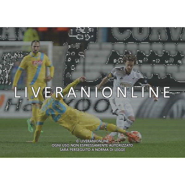 Swansea City\'s Jose Alberto Canas is tackled by Napoli\'s Blerim Dzemaili Photo by Ian Cook/CameraSport Football - UEFA Europa League Round of 32 - Swansea City v Napoli - Thursday 20th February 2014 - The Liberty Stadium - Swansea © CameraSport - 43 Linden Ave. Countesthorpe. Leicester. England. LE8 5PG - Tel: +44 (0) 116 277 4147 - admin@camerasport.com - www.camerasport.com AG ALDO LIVERANI SAS ONLY ITALY