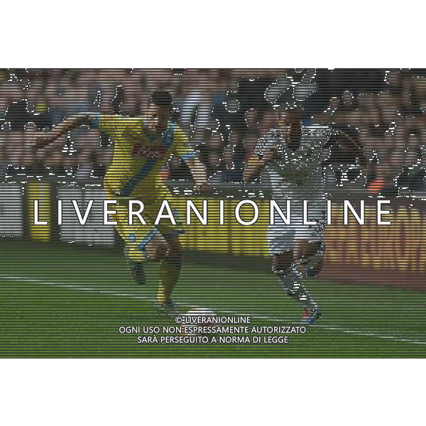 Swansea City\'s Wayne Routledge battles with Napoli\'s Cristian Maggio Photo by Ian Cook/CameraSport Football - UEFA Europa League Round of 32 - Swansea City v Napoli - Thursday 20th February 2014 - The Liberty Stadium - Swansea © CameraSport - 43 Linden Ave. Countesthorpe. Leicester. England. LE8 5PG - Tel: +44 (0) 116 277 4147 - admin@camerasport.com - www.camerasport.com AG ALDO LIVERANI SAS ONLY ITALY