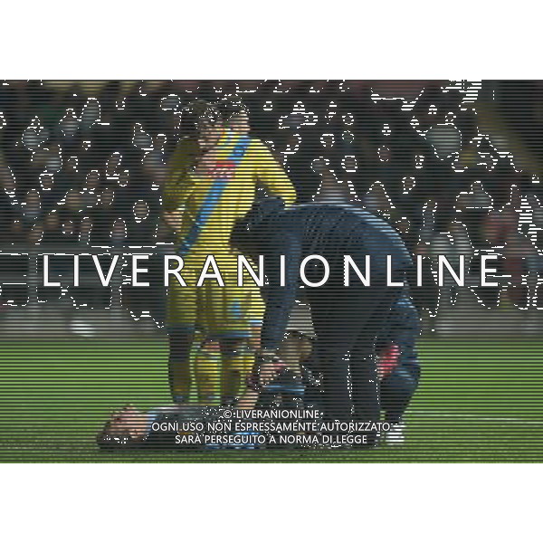 Napoli\'s Rafael is seen by the medics after injuring his leg Photo by Ian Cook/CameraSport Football - UEFA Europa League Round of 32 - Swansea City v Napoli - Thursday 20th February 2014 - The Liberty Stadium - Swansea © CameraSport - 43 Linden Ave. Countesthorpe. Leicester. England. LE8 5PG - Tel: +44 (0) 116 277 4147 - admin@camerasport.com - www.camerasport.com AG ALDO LIVERANI SAS ONLY ITALY