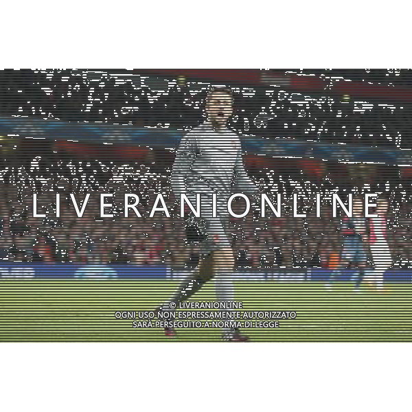 19.02.2014, Emirates Stadion, London, ENG, UEFA CL, FC Arsenal vs FC Bayern Muenchen, Achtelfinale, im Bild Lukasz FABIANSKI #21 (FC Arsenal London) haelt den elfmeter // during the UEFA Champions League Round of 16 match between FC Arsenal and FC Bayern Munich at the Emirates Stadion in London, Great Britain on 2014/02/19. EXPA Pictures © 2014, PhotoCredit: EXPA/ Eibner-Pressefoto/ Kolbert *****ATTENTION - OUT of GER***** ©PHOTOSHOT/AGENZIA ALDO LIVERANI SAS - ITALY ONLY - EDITORIAL USE ONLY - ARSENAL Vs BAYERN MONACO CHAMPIONS LEAGUE