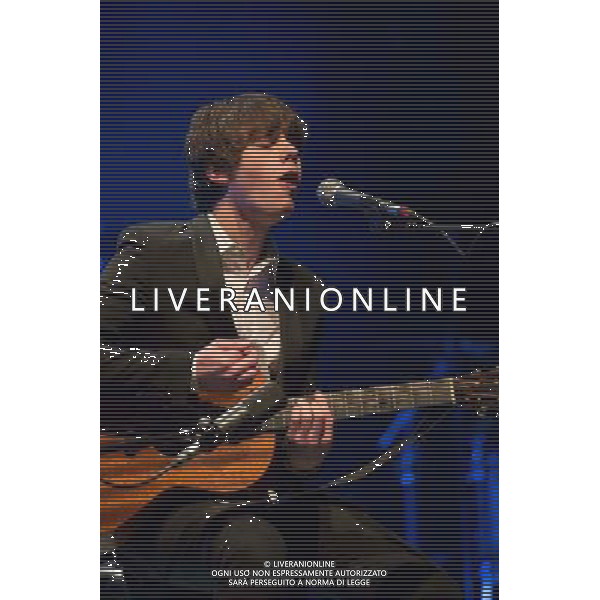 Jake Bugg performing live in concert headlining the first Albert Session of 2014 at the Royal Albert Hall, (RAH), London, United Kingdom. Ahead of this Albert Sessions concert, Jake is supporting the Hall\'s education and outreach programme by preparing a group of young vocalists for a once-in-a-lifetime opportunity. Date: 21/02/2014 AG ALDO LIVERANI SAS ONLY ITALY