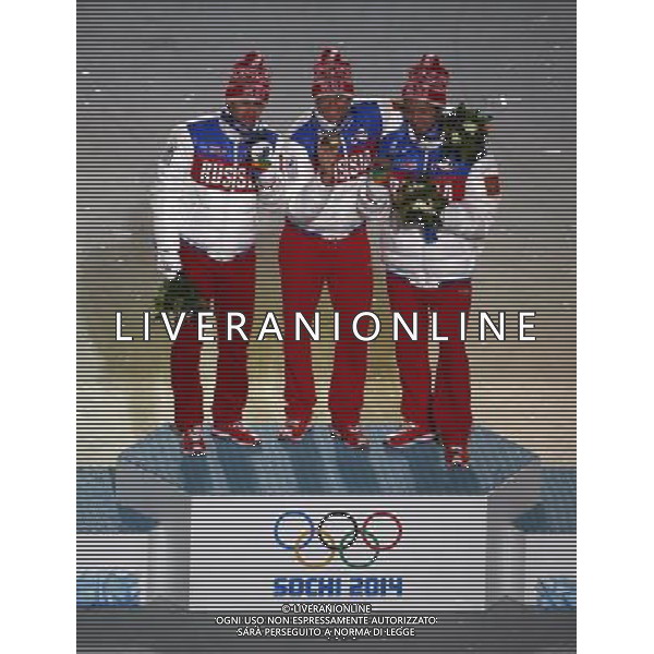 (140223) -- SOCHI, Feb. 23, 2014 () -- Gold medalist Alexander Legkov (C), silver medalist Maxim Vylegzhanin (L) and bronze medalist Ilia Chernousov of Russia pose during the awarding ceremony for the cross country men\'s 50km mass start free at the 22nd Winter Olympic Games in Sochi, Russia, Feb. 23, 2014. (/Wang Lili) ©photoshot/AGENZIA ALDO LIVERANI SAS - ITALY ONLY - Cerimonia di chiusura dei 22mi Giochi Olimpici Invernali Olimpiadi di Sochi, Russia 23 febbraio 2014
