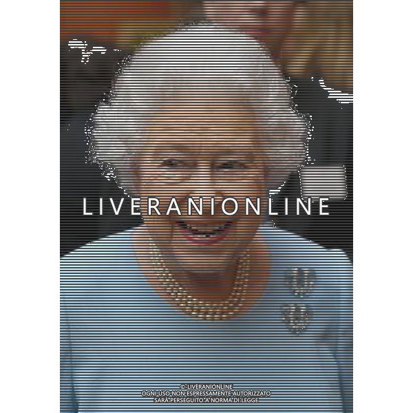 LONDON, ENGLAND - FEBRUARY 27: Queen Elizabeth II smiles as she attends a reception for the Queen\'s Anniversary Prizes for Higher and Further Education at Buckingham Palace on February 27, 2014 in London, England. AG ALDO LIVERANI SAS ONLY ITALY