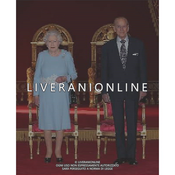 LONDON, ENGLAND - FEBRUARY 27: Queen Elizabeth II and Prince Phillip, Duke of Edinburgh prepare to present awards for the Queen\'s Anniversary Prizes for Higher and Further Education at Buckingham Palace on February 27, 2014 in London, England. AG ALDO LIVERANI SAS ONLY ITALY