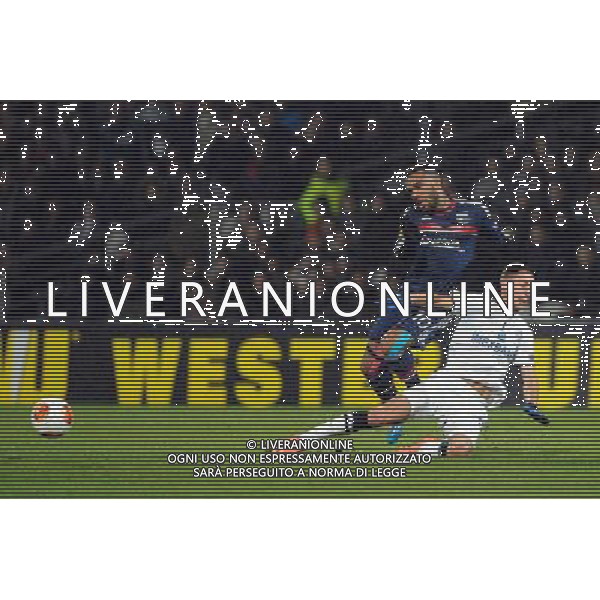 Evgeniy Zubeiko / Alexandre Lacazette - 27.02.2014 - Lyon / Tchernomorets Odessa - Ligue Europa 2013/2014 Photo : Jean Paul Thomas / Icon Sport *** Local Caption *** AG ALDO LIVERANI SAS ONLY ITALY *** Local Caption *** AG ALDO LIVERANI SAS ONLY ITALY