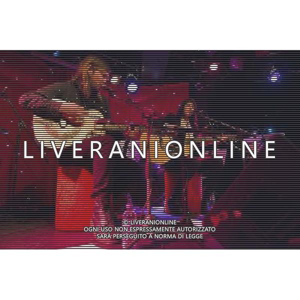 Russell Marsden, guitar and vocals and Emma Richardson, bassist and vocals with Band of Skulls perform at their acoustic set in Madame JoJo\'s, London, on the first 2014 tour date ***EXCLUSIVE*** AG ALDO LIVERANI SAS ONLY ITALY