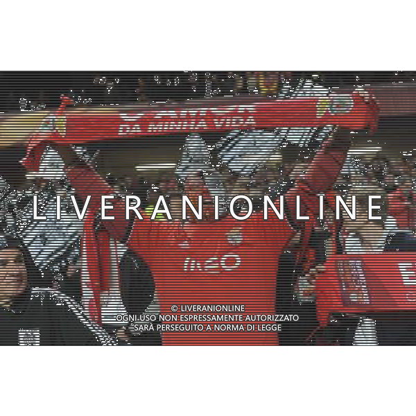 (140228) -- LISBON, Feb. 28, 2014 () -- Supporters of Benfica celebrate during the UEFA Europa League round of 32 second-leg football match between Benfica and PAOK Thessaloniki of Greece at the Luz stadium in Lisbon, capital of Portugal, on Feb. 27, 2014. Benfica defeated PAOK 3-0 to go through 4-0 on aggregate. (/Zhang Liyun) (hy) AG ALDO LIVERANI SAS ONLY ITALY