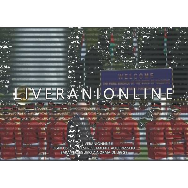 (140228) -- JAKARTA, Feb. 28, 2014 () -- Palestinian prime minister Rami Hamdallah (Front) inspects the guard of honor during his visit at the presidential palace in Jakarta, Indonesia, Feb. 28, 2014. (/Agung Kuncahya B.) AG ALDO LIVERANI SAS ONLY ITALY
