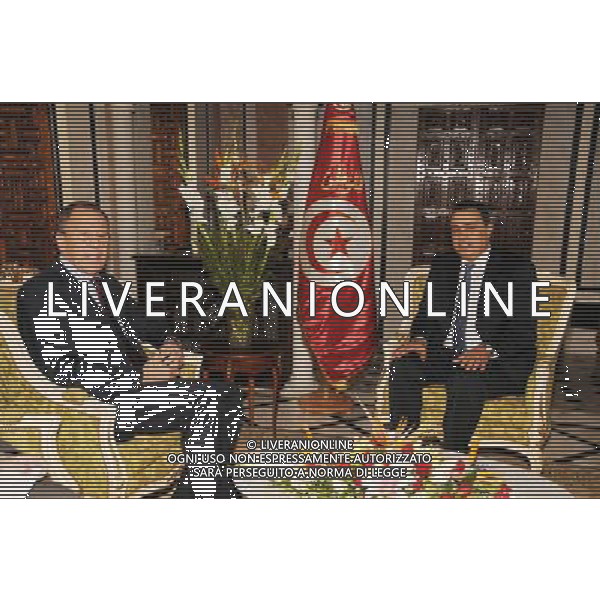 (140304) -- TUNIS, Mar. 4, 2014 () -- Russian Foreign Minister Sergey Lavrov (L) meets with Tunisian Prime Minister Mehdi Jemaa in Tunis, capital of Tunisia, on Mar. 4, 2014. Sergey Lavrov is on a two day visit to Tunisia. (/Adher) AG ALDO LIVERANI SAS ONLY ITALY