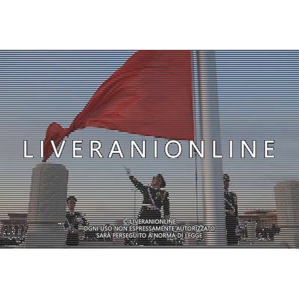 (140305) -- BEIJING, March 5, 2014 () -- A flag-raising ceremony is held at the Tian\'anmen Square in Beijing, capital of China, March 5, 2014. The second session of China\'s 12th National People\'s Congress (NPC), the national legislature, opened in Beijing on March 5. (/Liu Changlong) (zkr)
