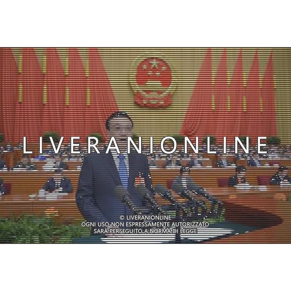(140305) -- BEIJING, March 5, 2014 () -- Chinese Premier Li Keqiang delivers the government work report during the opening meeting of the second session of the 12th National People\'s Congress (NPC) at the Great Hall of the People in Beijing, capital of China, March 5, 2014. (/Li Xueren) (zkr) AG ALDO LIVERANI SAS ONLY ITALY