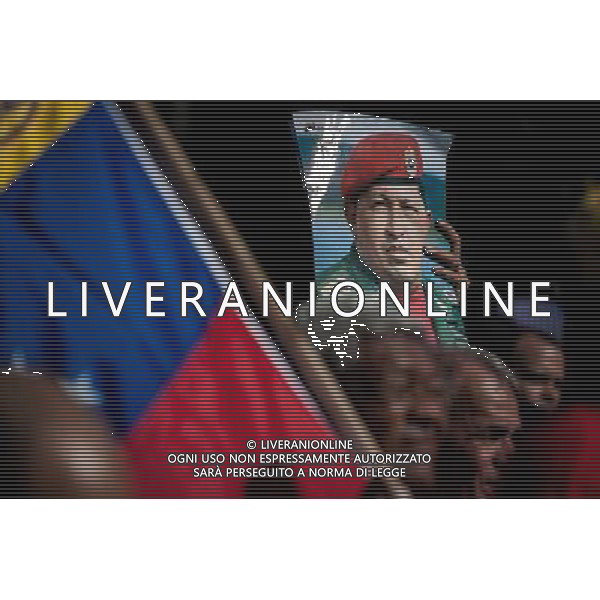 (140306) -- HAVANA, March 6, 2014 () -- People participate in a meeting to commemorate the first anniversary of the death of former Venezuelan leader Hugo Chavez, in Havana, capital of Cuba, on March 5, 2014. (/Liu Bin)(axy) AG ALDO LIVERANI SAS ONLY ITALY