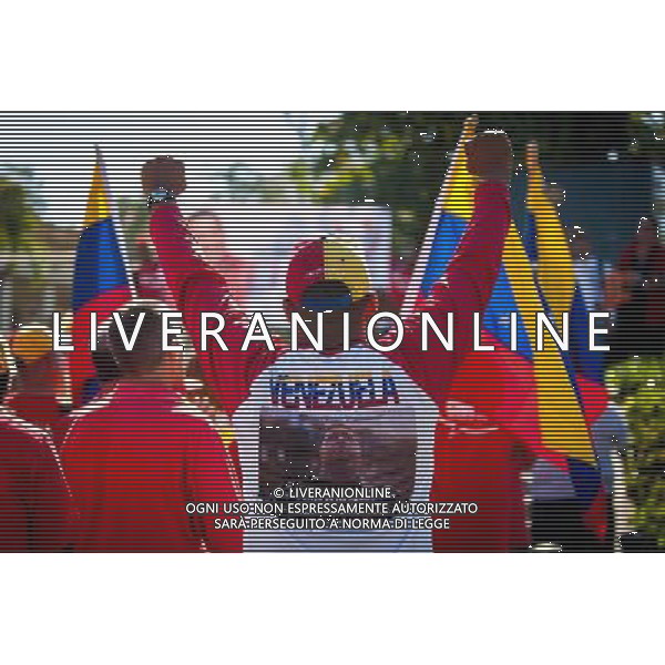 (140306) -- HAVANA, March 6, 2014 () -- People participate in a meeting to commemorate the first anniversary of the death of former Venezuelan leader Hugo Chavez, in Havana, capital of Cuba, on March 5, 2014. (/Liu Bin)(axy) AG ALDO LIVERANI SAS ONLY ITALY