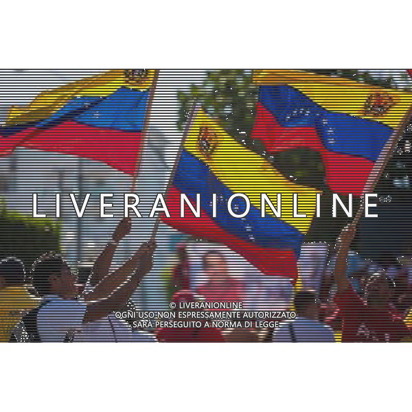 (140306) -- HAVANA, March 6, 2014 () -- People participate in a meeting to commemorate the first anniversary of the death of former Venezuelan leader Hugo Chavez, in Havana, capital of Cuba, on March 5, 2014. (/Liu Bin)(axy) AG ALDO LIVERANI SAS ONLY ITALY