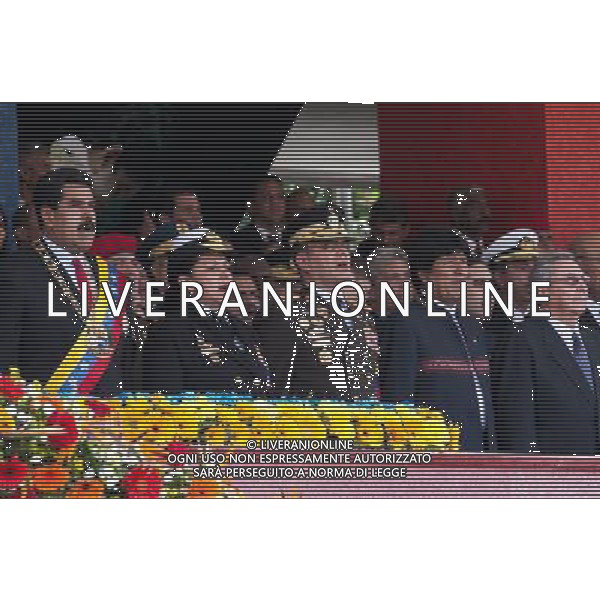 (140306) -- CARACAS, March 6, 2014 () -- Venezuelan President Nicolas Maduro (L) sings the Venezuela\'s national anthem accompanied by his counterparts of Bolivia, Evo Morales (2nd-R), and Cuba, Raul Castro (R), during the civic-military parade in honor of late Venezuelan President Hugo Chavez to mark the first anniversary of his death at Paseo Los Proceres in Caracas, Venezuela, on March 5, 2014. (/Boris Vergara) (fnc) (ce) AG ALDO LIVERANI SAS ONLY ITALY