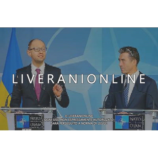 (140307) -- BRUSSELS, March 7, 2014 () -- Ukrainian Prime Minister Arseniy Yatsenyuk (L) and NATO Secretary General Anders Fogh Rasmussen attend a press conference at the NATO headquarters in Brussels, capital of Belgium, March 6, 2014. (/Gong Bing) AG ALDO LIVERANI SAS ONLY ITALY