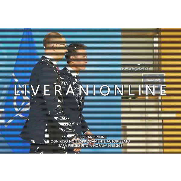(140307) -- BRUSSELS, March 7, 2014 () -- Ukrainian Prime Minister Arseniy Yatsenyuk (L) and NATO Secretary General Anders Fogh Rasmussen leave after a press conference at the NATO headquarters in Brussels, capital of Belgium, March 6, 2014. (/Gong Bing) AG ALDO LIVERANI SAS ONLY ITALY