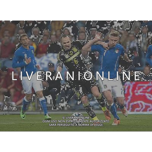 (140306) -- MADRID, March 6, 2014 () -- Andrea Iniesta(C) of Spain vies the ball during an international friendly football match between Italy and Spain at Madrid, Spain on March 5, 2014. Spain won 1-0.(/Xie Haining) AG ALDO LIVERANI SAS ONLY ITALY