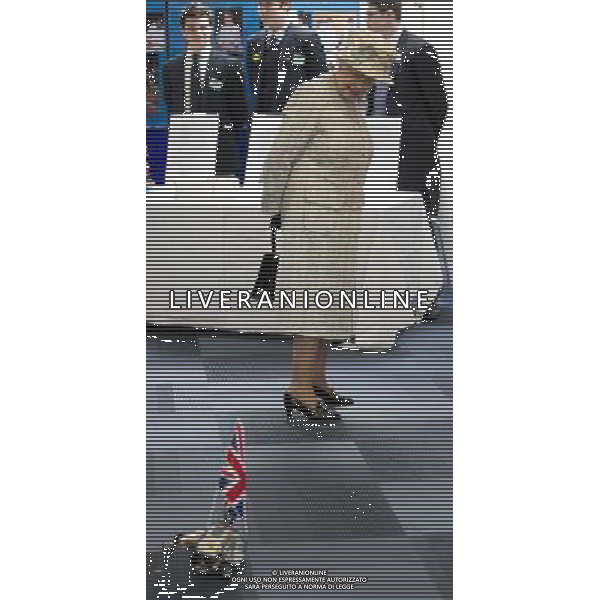 Britain\'s Queen Elizabeth II looks at a robotic demonstration as she visits Reed\'s School, in Cobham, England, Thursday, March, 6, 2014. The school originally founded in 1813 in the east end of London, as the London Orphan Asylum. The Queen who is Patron of the school is visiting to help it celebrate is bicentenary. AG ALDO LIVERANI SAS ONLY ITALY