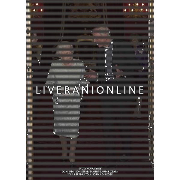 The Queen, accompanied by The Duke of Edinburgh,attending a reception to mark the launch of the Christ Church Cathedral Music Trust. The Queen chats to The Dean of Christ Church The Very Rev\'d Christopher Lewis AG ALDO LIVERANI SAS ONLY ITALY