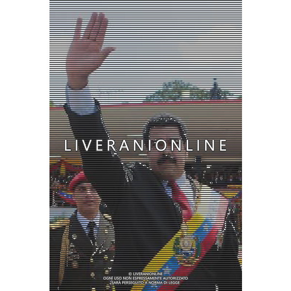 (140305) -- CARACAS, March 5, 2014 () -- Venezuelan President Nicolas Maduro waves as he arrives to the civic-military parade in honor of late Venezuelan President Hugo Chavez, on the framework of the first anniversary of his death, at Paseo Los Proceres, in Caracas, Venezuela, on March 5, 2014. (/AVN) AG ALDO LIVERANI SAS ONLY ITALY