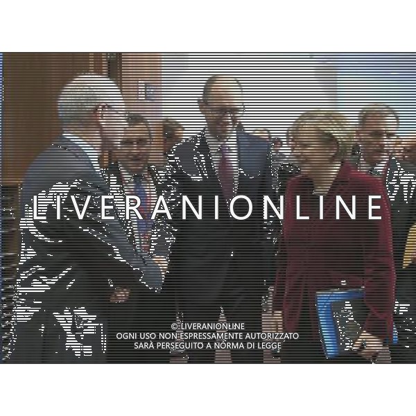 (140306) -- BRUSSELS, March 6, 2014 () -- President of European Council Herman Van Rompuy (1st L) greets Ukrainian Prime Minister Arseniy Yatsenyuk (3rd L) and German Chancellor Angela Merkel (2nd R) prior to the EU extraordinary summit in Brussels, capital of Belgium, March 6, 2014. European Union (EU) leaders will discuss situation in Ukraine during the extraordinary summit on Thursday. () ©PPHOTOSHOT/AGENZIA ALDO LIVERANI SAS - ITALY ONLY - Vertice UE-Ucraina degli stati presso la sede dell\'Unione europea a Bruxelles , capitale del Belgio, 6 marzo 2014.