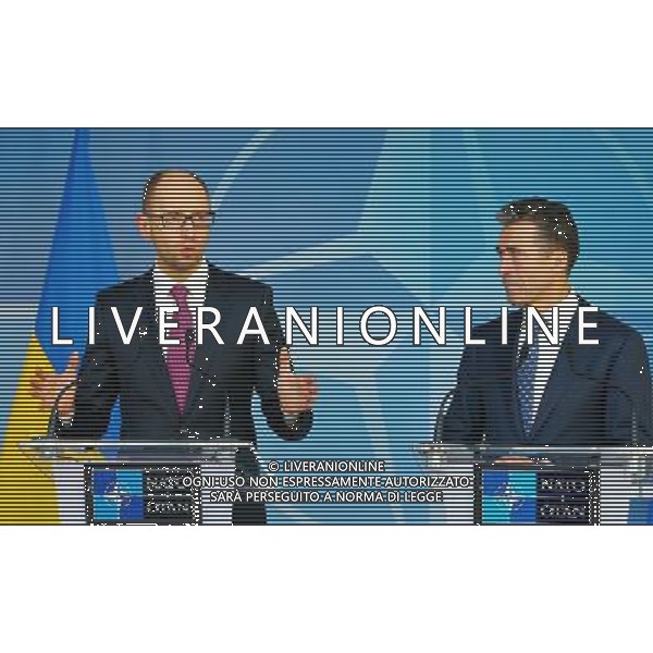 (140307) -- BRUSSELS, March 7, 2014 () -- Ukrainian Prime Minister Arseniy Yatsenyuk (L) and NATO Secretary General Anders Fogh Rasmussen attend a press conference at the NATO headquarters in Brussels, capital of Belgium, March 6, 2014. (/Gong Bing) ©PPHOTOSHOT/AGENZIA ALDO LIVERANI SAS - ITALY ONLY - Vertice UE-Ucraina degli stati presso la sede dell\'Unione europea a Bruxelles , capitale del Belgio, 6 marzo 2014.