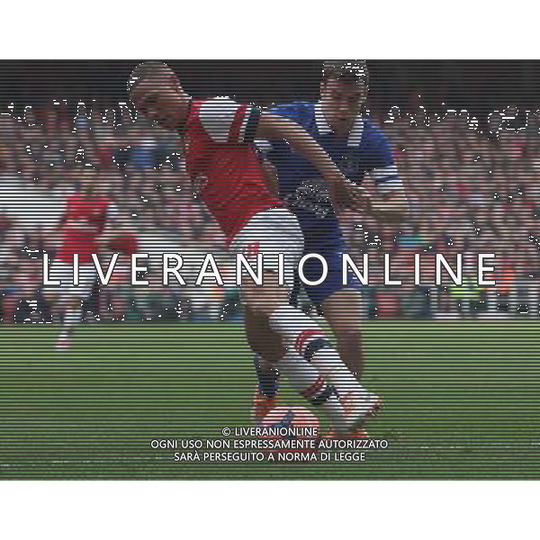 Arsenal\'s Kieran Gibbs despite the attentions of Everton\'s Seamus Coleman Photo by Kieran Galvin/CameraSport Football - FA Challenge Cup Quarter-Final - Arsenal v Everton - Saturday 8th March 2014 - Emirates Stadium - London © CameraSport - 43 Linden Ave. Countesthorpe. Leicester. England. LE8 5PG - Tel: +44 (0) 116 277 4147 - admin@camerasport.com - www.camerasport.com AG ALDO LIVERANI SAS ONLY ITALY