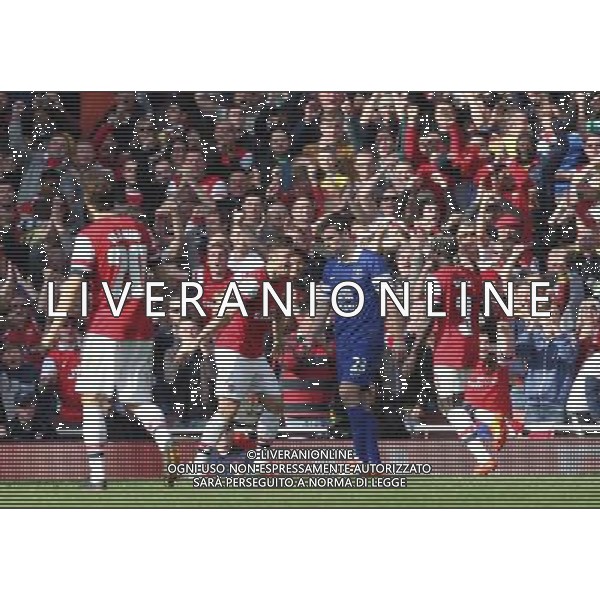 Arsenal\'s Olivier Giroud celebrates scoring his sides third goal Photo by Kieran Galvin/CameraSport Football - FA Challenge Cup Quarter-Final - Arsenal v Everton - Saturday 8th March 2014 - Emirates Stadium - London © CameraSport - 43 Linden Ave. Countesthorpe. Leicester. England. LE8 5PG - Tel: +44 (0) 116 277 4147 - admin@camerasport.com - www.camerasport.com AG ALDO LIVERANI SAS ONLY ITALY