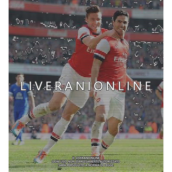 OLIVIER GIROUD \' MIKEL ARTETA ARSENAL FC V EVERTON FC ARSENAL FC V EVERTON FC, THE BUDWEISER FA CUP QUARTER FINAL EMIRATES STADIUM, LONDON, ENGLAND 08 March 2014 GAT79239 THE BUDWEISER FA CUP QUARTER FINALS WARNING! This Photograph May Only Be Used For Newspaper And/Or Magazine Editorial Purposes. May Not Be Used For Publications Involving 1 player, 1 Club Or 1 Competition Without Written Authorisation From Football DataCo Ltd. For Any Queries, Please Contact Football DataCo Ltd on +44 (0) 207 864 9121 AG ALDO LIVERANI SAS ONLY ITALY