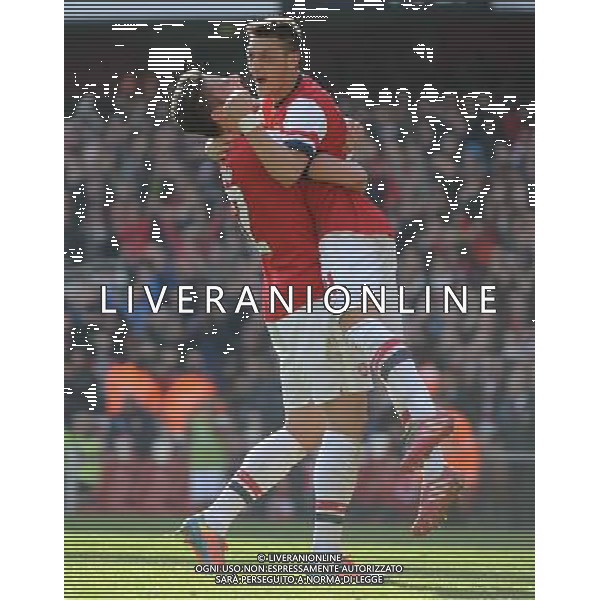 MESUT OZIL, OLIVIER GIROUD ARSENAL FC V EVERTON FC ARSENAL FC V EVERTON FC, THE BUDWEISER FA CUP QUARTER FINAL EMIRATES STADIUM, LONDON, ENGLAND 08 March 2014 GAT79236 THE BUDWEISER FA CUP QUARTER FINALS WARNING! This Photograph May Only Be Used For Newspaper And/Or Magazine Editorial Purposes. May Not Be Used For Publications Involving 1 player, 1 Club Or 1 Competition Without Written Authorisation From Football DataCo Ltd. For Any Queries, Please Contact Football DataCo Ltd on +44 (0) 207 864 9121 AG ALDO LIVERANI SAS ONLY ITALY