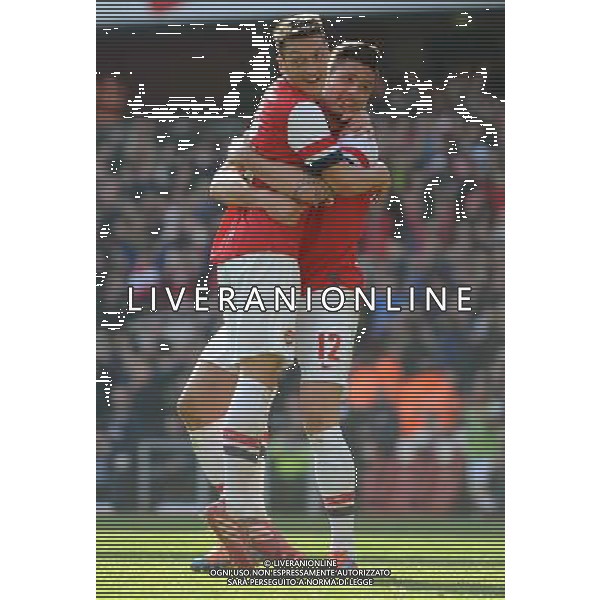 MESUT OZIL, OLIVIER GIROUD, ARSENAL FC V EVERTON FC ARSENAL FC V EVERTON FC, THE BUDWEISER FA CUP QUARTER FINAL EMIRATES STADIUM, LONDON, ENGLAND 08 March 2014 GAT79235 THE BUDWEISER FA CUP QUARTER FINALS WARNING! This Photograph May Only Be Used For Newspaper And/Or Magazine Editorial Purposes. May Not Be Used For Publications Involving 1 player, 1 Club Or 1 Competition Without Written Authorisation From Football DataCo Ltd. For Any Queries, Please Contact Football DataCo Ltd on +44 (0) 207 864 9121 AG ALDO LIVERANI SAS ONLY ITALY