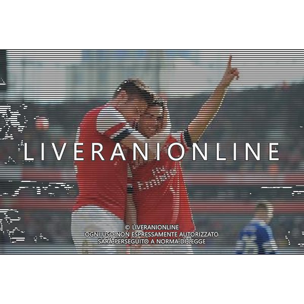 MIKEL ARTETA SCORES PENALTY AND CELEBRATES WITH OLIVIER GIROUD ARSENAL FC V EVERTON FC ARSENAL FC V EVERTON FC, THE BUDWEISER FA CUP QUARTER FINAL EMIRATES STADIUM, LONDON, ENGLAND 08 March 2014 GAT79226 THE BUDWEISER FA CUP QUARTER FINALS WARNING! This Photograph May Only Be Used For Newspaper And/Or Magazine Editorial Purposes. May Not Be Used For Publications Involving 1 player, 1 Club Or 1 Competition Without Written Authorisation From Football DataCo Ltd. For Any Queries, Please Contact Football DataCo Ltd on +44 (0) 207 864 9121 AG ALDO LIVERANI SAS ONLY ITALY