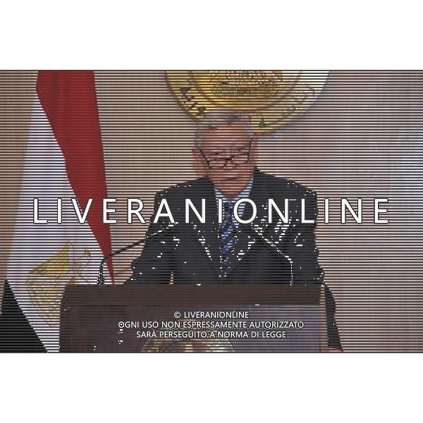 (140308) -- CAIRO, March 8, 2014 () -- This handout photo from official MENA news agency shows Ali Awad, legal and constitutional adviser of Egypt\'s interim President Adli Mansour, speaking during a press conference in Cairo, capital of Egypt, on March 8, 2014. Egypt\'s interim President Adli Mansour has approved and issued a long-waited new law regulating country\'s upcoming presidential elections, officials said on Saturday. (/MENA) (djj) AG ALDO LIVERANI SAS ONLY ITALY