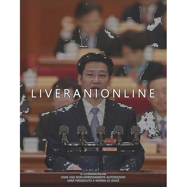 (140309) -- BEIJING, March 9, 2014 () -- He Junke, member of the 12th National Committee of the Chinese People\'s Political Consultative Conference (CPPCC), speaks at the fourth plenary meeting of the second session of the 12th National Committee of the CPPCC at the Great Hall of the People in Beijing, capital of China, March 9, 2014. (/Lan Hongguang) (zkr) ©PHOTOSHOT/AGENZIA ALDO LIVERANI SAS - ITALY ONLY - EDITORIAL USE ONLY